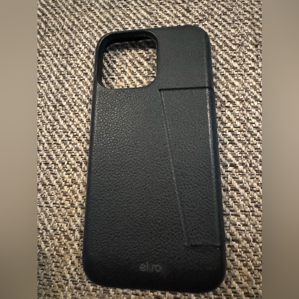 Black, pebble leather Bellroy phone case, 14 Pro Max